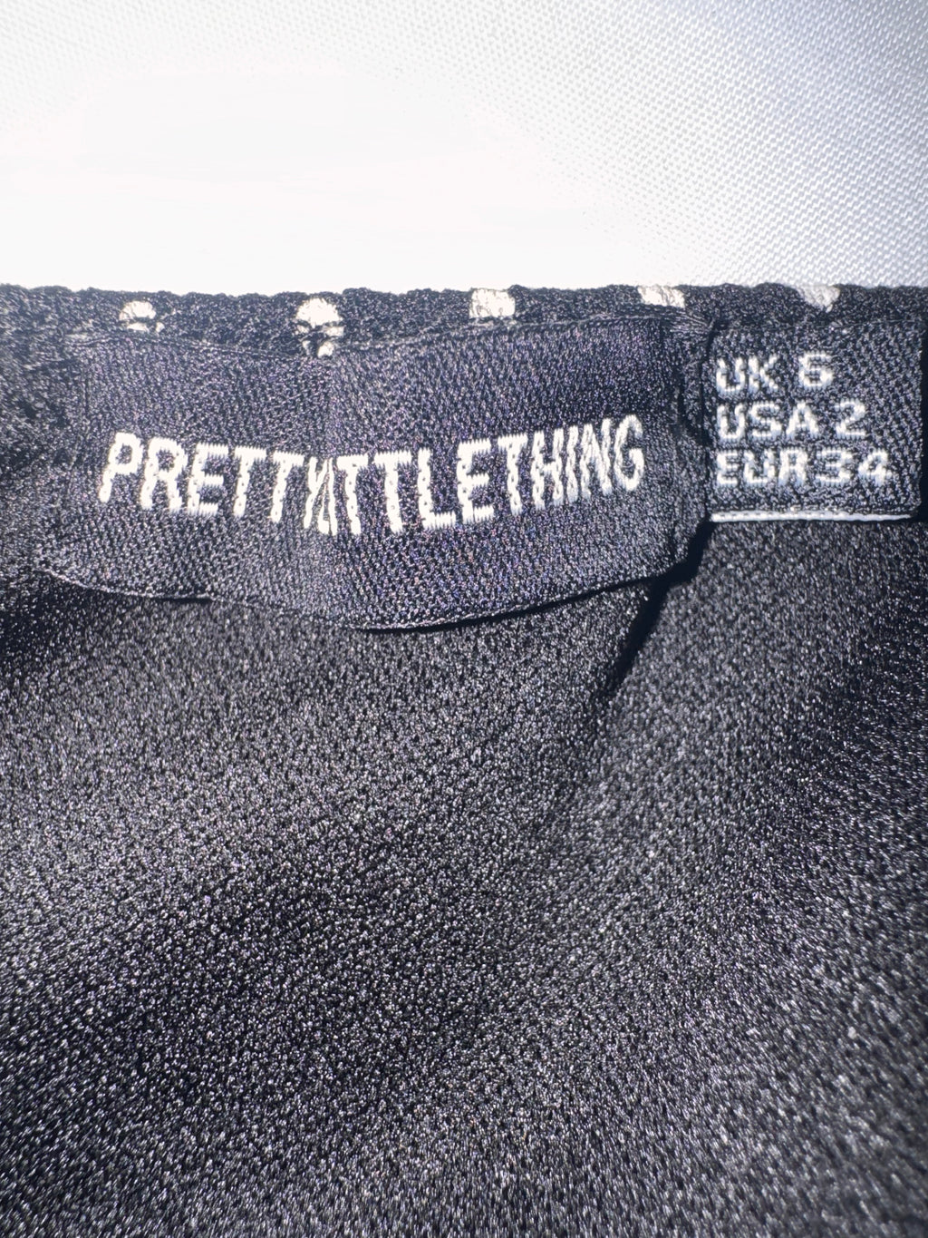 Combinaison pantalon noire à pois PrettyLittleThing – Taille 34