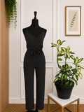 Combinaison pantalon noire à pois PrettyLittleThing – Taille 34