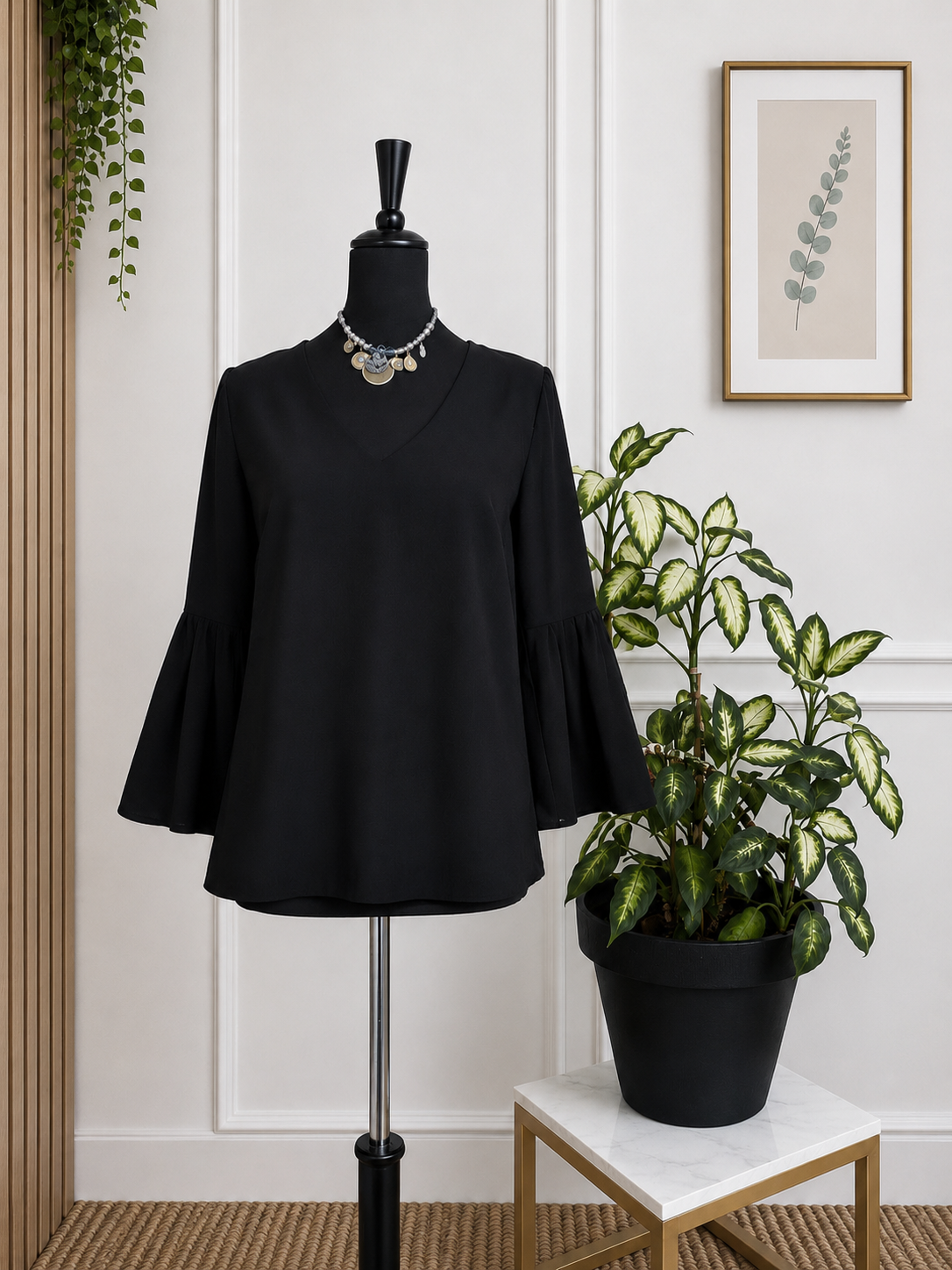 Blouse H&M noire à manches évasées – Taille 36