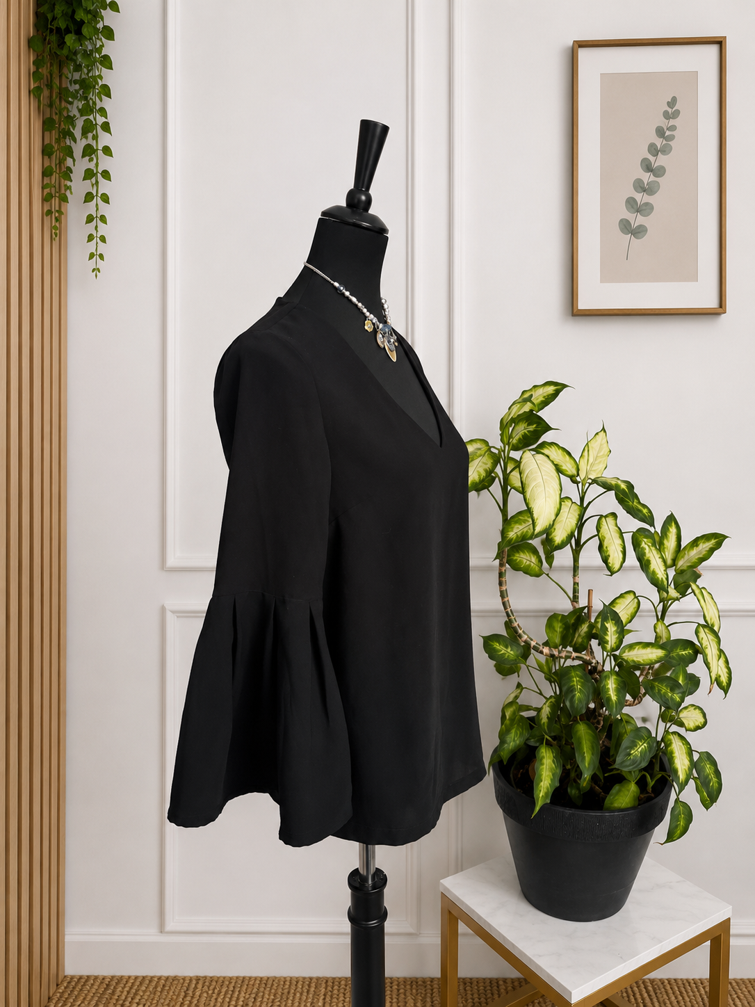 Blouse H&M noire à manches évasées – Taille 36